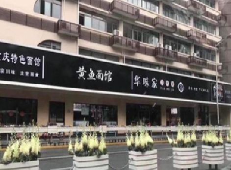东兴政府为什么要统一规划店铺招牌？